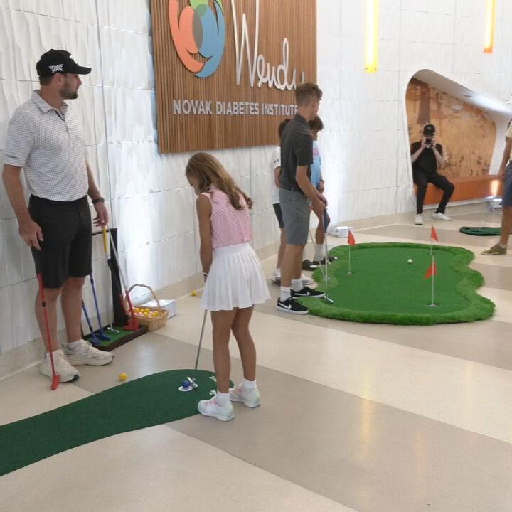 PGA GOLFERS WITH DIABETIC KIDS